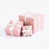Pink wrapping with white bow