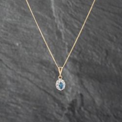 Second Hand 9ct Two Colour Gold Blue Topaz & 0.04ct Diamond Oval Cluster Pendant & 18 Inch Curb Chain 41142863
