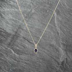 Second Hand Yellow Gold Sapphire Oval Rubover Set Pendant & 18 Inch Curb Chain 41142941