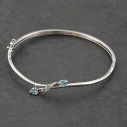 Second Hand 9ct White Gold Blue Topaz & Diamond Crossover Hinged Bangle 41211354