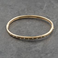 Second Hand 9ct Yellow Gold 0.26ct Diamond Rubover Set Hinged Bangle 41211415