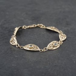Second Hand 9ct Yellow Gold Blue Topaz Celtic Style 7.5 Inch Bracelet 41281328