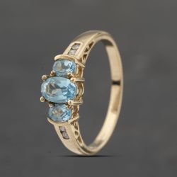 Second Hand 9ct Yellow Gold Blue Topaz & Diamond Oval Seven Stone Ring 41383391