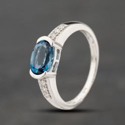 Second Hand 9ct White Gold Blue Topaz & 0.03ct Diamond Oval Cluster Ring 41383876