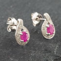 Second Hand White Gold 0.38ct Oval Cut Ruby & 0.03ct Diamond Swirl Stud Earrings 43171089