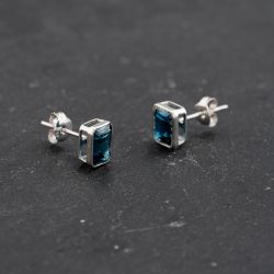 Second Hand White Gold 7.5mm Blue Topaz Oblong Stud Earrings 43171382