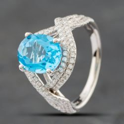 Second Hand 14ct White Gold Oval Cut Blue Topaz & Single Cut Diamond Crossover Ring 43451006