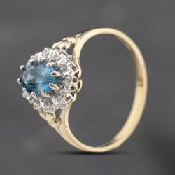 Second Hand 9ct Yellow Gold Blue Topaz & 0.05ct Diamond Heart Engraved Shoulders Oval Cluster Ring 43451021