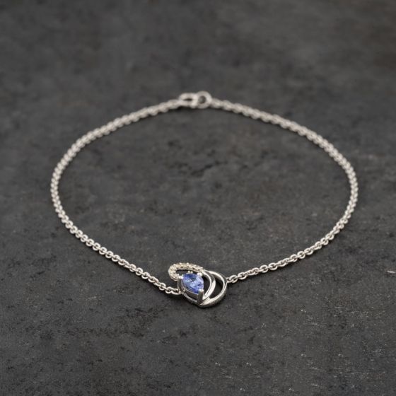 Second Hand White Gold 0.35ct Tanzanite & 0.07ct Diamond Pear Shaped Ribbon Curl 7 Inch Belcher Bracelet 41061320