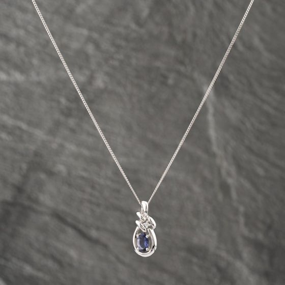 Second Hand 9ct White Gold Tanzanite & Cubic Zirconia Oval Pendant & 16 Inch Curb Chain 41142578
