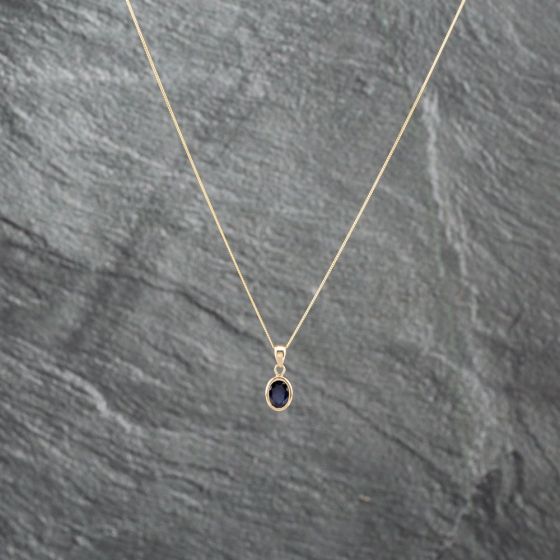 Second Hand Yellow Gold Sapphire Oval Rubover Set Pendant & 18 Inch Curb Chain 41142941
