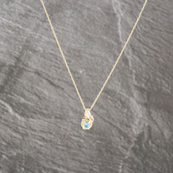 Second Hand 9ct Two Colour Gold Blue Topaz & 0.03ct Diamond Pendant & 18 Inch Prince Of Wales Chain 41143006