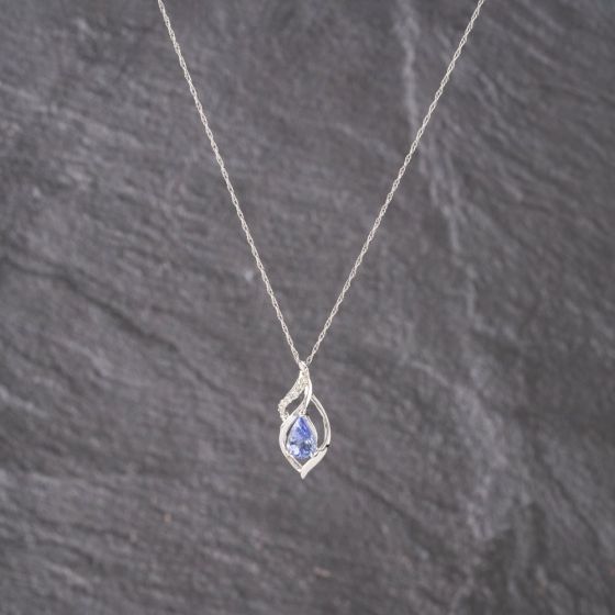 Second Hand White Gold 0.74ct Tanzanite & 0.05ct Diamond Pear Shaped Ribbon Pendant & 18 Inch Prince Of Wales Chain 41143160