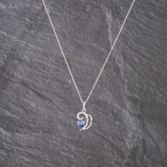 Second Hand White Gold 0.41ct Tanzanite & 0.06ct Diamond Pear Shaped Ribbon Curl Pendant & 18 Inch Prince Of Wales Chain 41143163