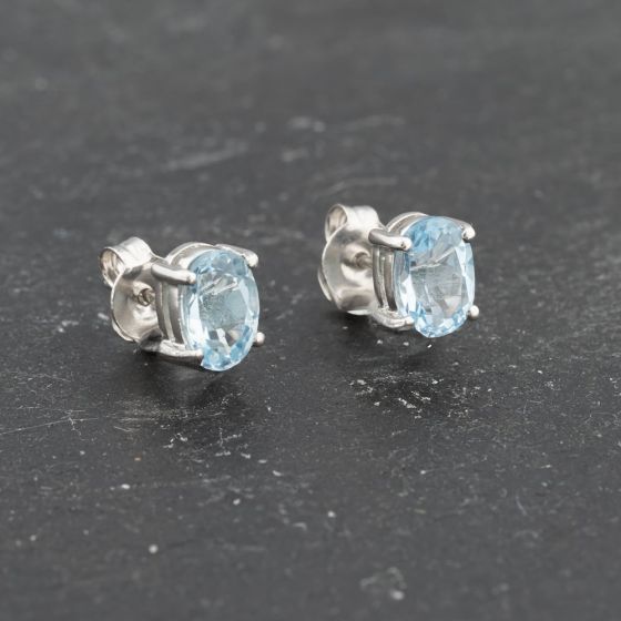 Second Hand 9ct White Gold 7mm Blue Topaz Oval Stud Earrings 41173388
