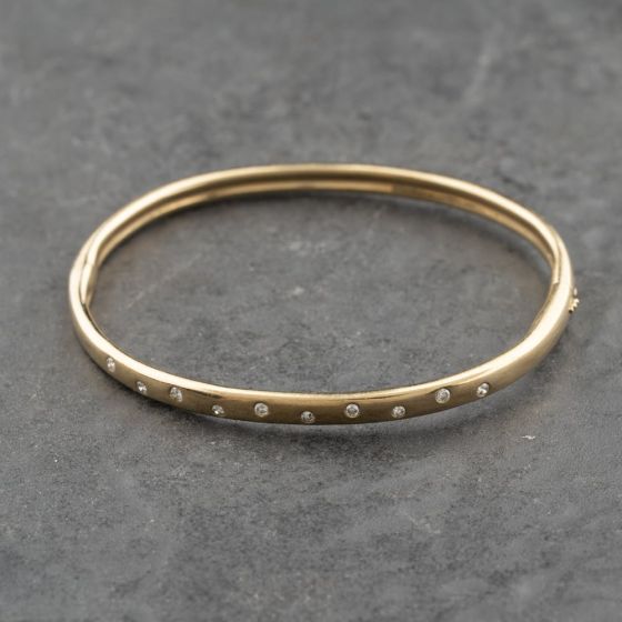 Second Hand 9ct Yellow Gold 0.26ct Diamond Rubover Set Hinged Bangle 41211415