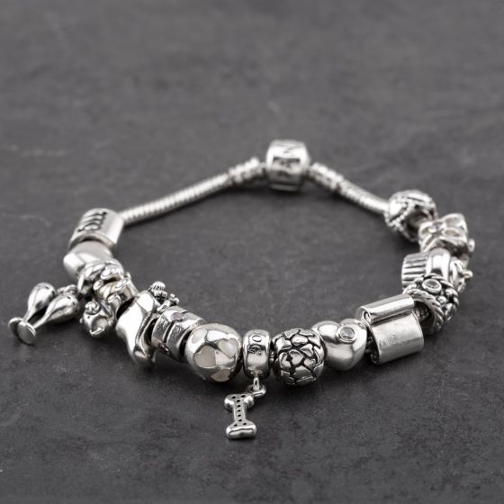 Second Hand Pandora Silver With Fifteen Various Charms 8 Inch Bracelet 41221431