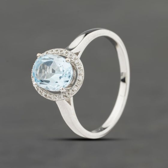 Second Hand 9ct White Gold Blue Topaz & 0.10ct Diamond Oval Cluster Ring 413302157963