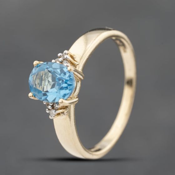 Second Hand 9ct Yellow Gold Blue Topaz & 0.03ct Diamond Oval Seven Stone Ring 41383303