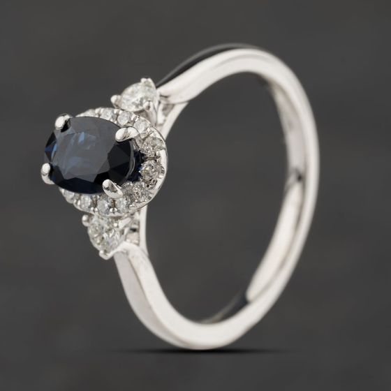 Second Hand 18ct White Gold Sapphire & 0.25ct Brilliant Cut Diamond Oval Diamond Shoulders Cluster Ring 41482351
