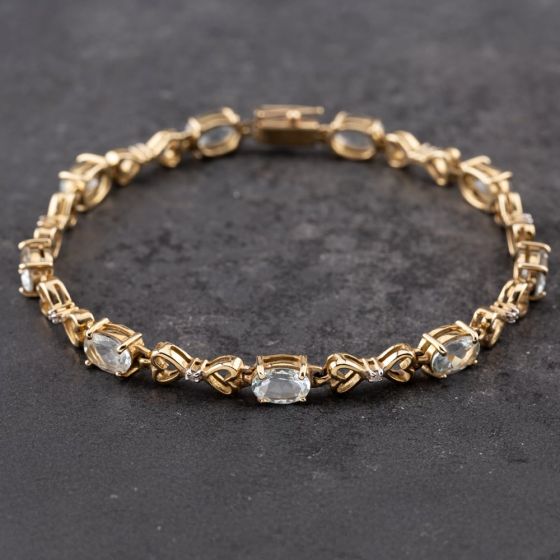 Second Hand 9ct Yellow Gold Blue Topaz & 0.08ct Brilliant Cut Diamond Hearts 7.5 Inch Bracelet 43071019