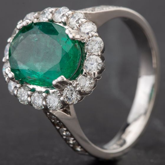 Second Hand 14ct White Gold Oval Emerald and Diamond Cluster Ring 4312333