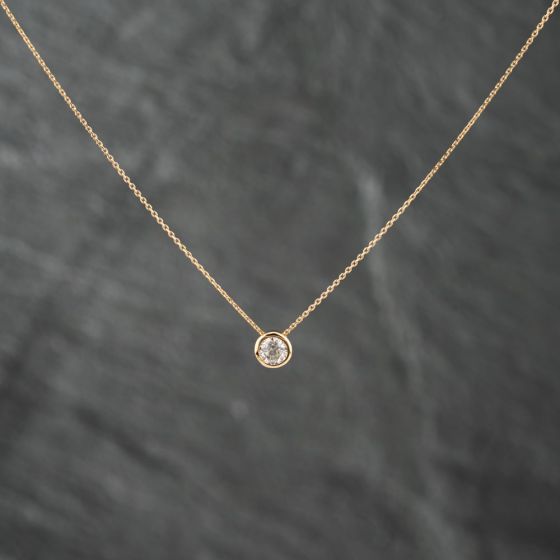 Second Hand 18ct Yellow Gold 0.52ct Brilliant Cut Diamond Single Stone Rubover Set Pendant & 16-18 Inch Trace Chain 43141214