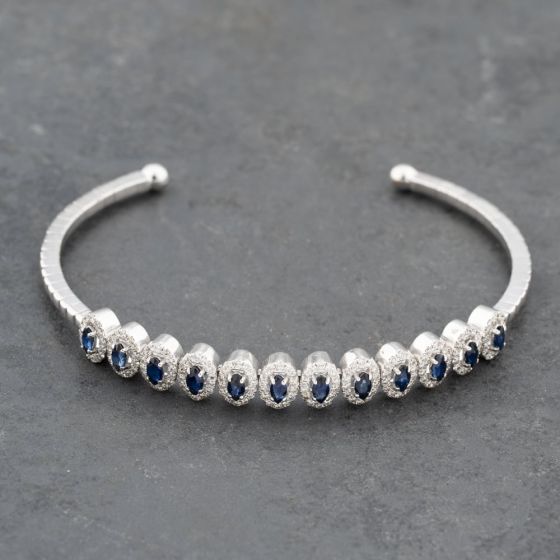 Second Hand 18ct White Gold Sapphire & 0.90ct Diamond Flexible Multi Cluster Medium Torque Bangle 43211016