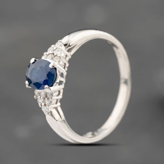 Second Hand Platinum 0.79ct Sapphire & 0.10ct Brilliant Cut Diamond Oval Cluster Ring 43361208