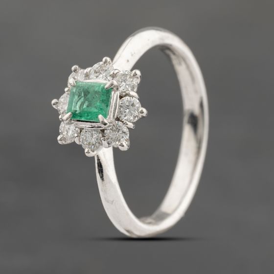 Second Hand Platinum Emerald & 0.33ct Brilliant Cut Diamond Oval Cluster Ring 43371062