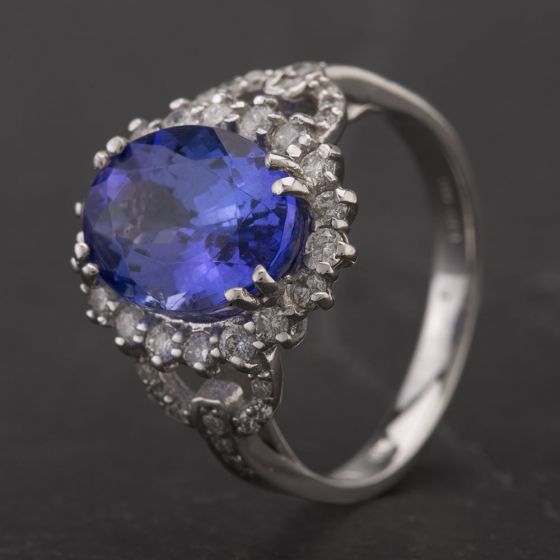 Second Hand 14ct White Gold Oval 4.40ct Tanzanite 0.60ct Diamond Cluster Ring 4341004