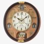 Seiko Melodies In Motion Brown Oval Wall Clock QXM601B