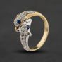 Second Hand 9ct Two Colour Gold Cubic Zirconia & Synthetic Blue Spinel Dolphin Crossover Ring 41104681