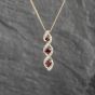Second Hand 9ct Yellow Gold Ruby & Diamond Swirl Pendant & 18 Inch Curb Chain 41142851