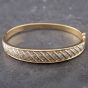 Second Hand 9ct Yellow Gold Diamond Graduating Standard Hinged Bangle 41211139