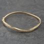 Second Hand 14ct Yellow Gold Brilliant Cut Diamond Channel Set Hinged Bangle 41211397