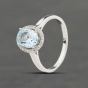 Second Hand 9ct White Gold Blue Topaz & 0.10ct Diamond Oval Cluster Ring 413302157963