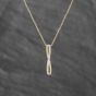 Second Hand 9ct Yellow Gold 0.10ct Brilliant Cut Diamond Crossover Twist Bar Gemstone Pendant & 16-18 Inch Trace Chain 43141358