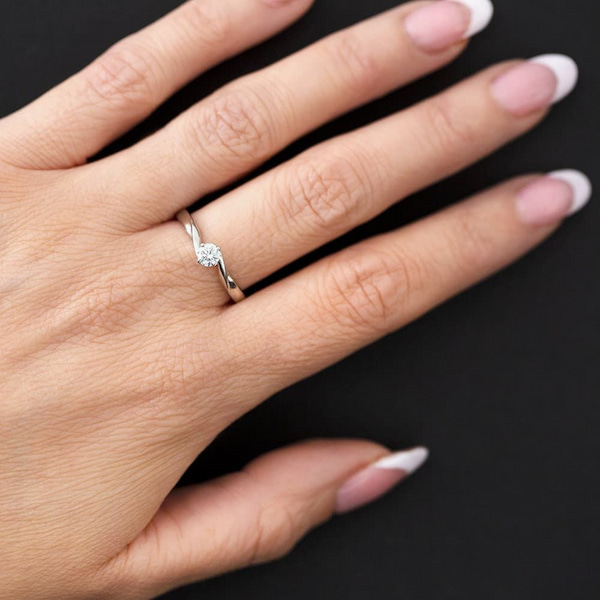 Platinum 0.25ct Brilliant Cut Diamond Solitaire Twist Ring