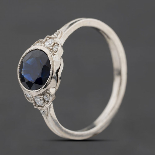 Second Hand Platinum Sapphire & 0.11ct Diamond Round Rubover Set Dress Ring