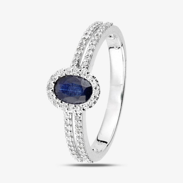 T.H.Baker 18ct White Gold Oval Sapphire & 0.20ct Diamond Halo Ring