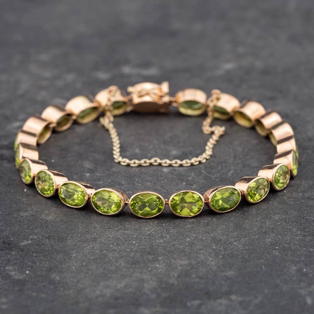 Second Hand Vintage Yellow Gold Oval Cut Peridot Inch Tennis